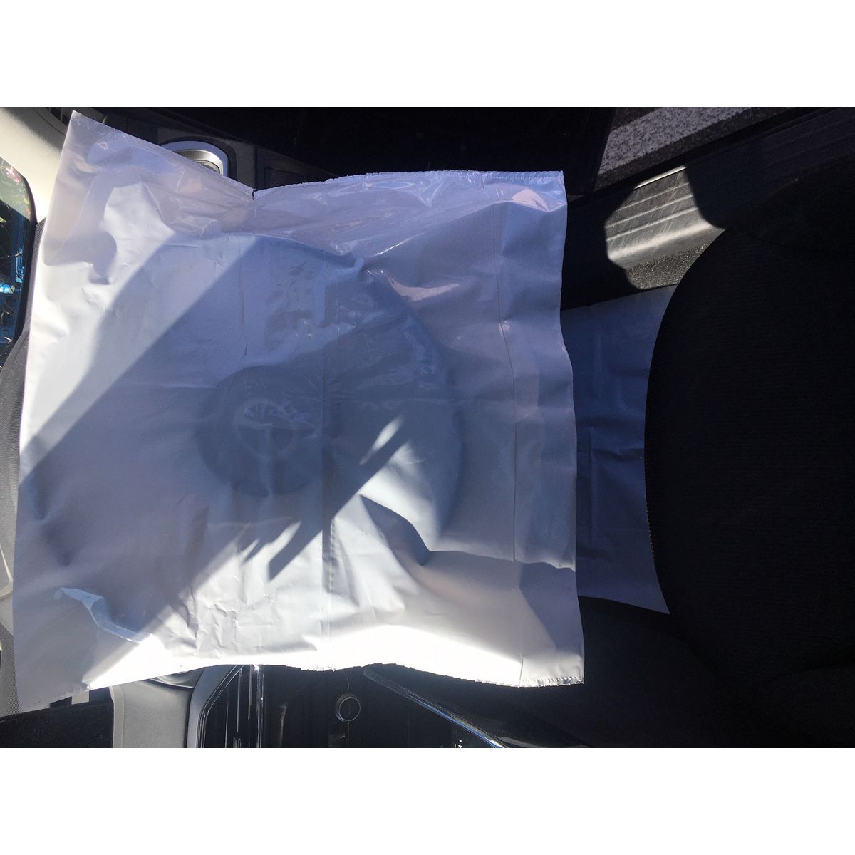 Multiflex Packaging Multifit Plain White Plastic Disposable Steering Wheel Cover - 1000 Per Roll PFB6105